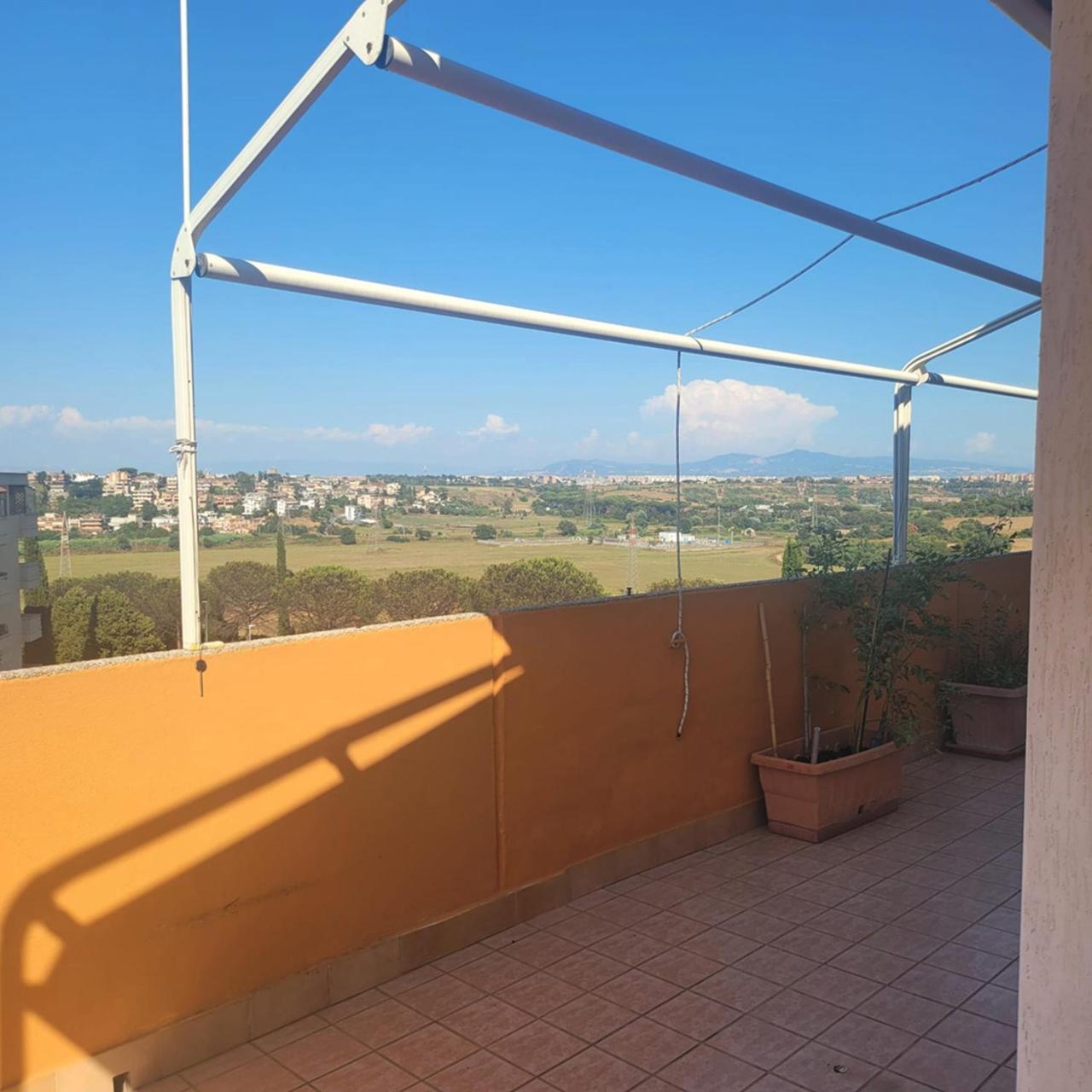 Alloggio Per Uso Turistico Ecm Giardino Di Roma Vitinia Bagian luar foto